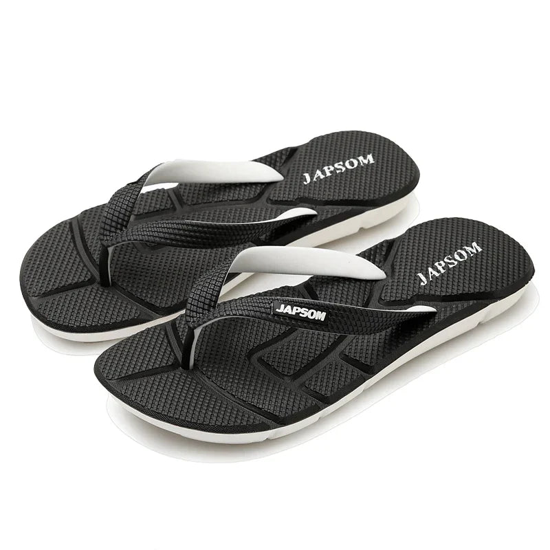 Schwarze Japsom Flip-Flops aus Gummi, rutschfest, bequem, ideal für Sommer und Strand.
