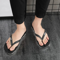 Schwarze Flip-Flops aus Gummi, Unisex, bequem, rutschfest, ideal für Sommer und Strand.