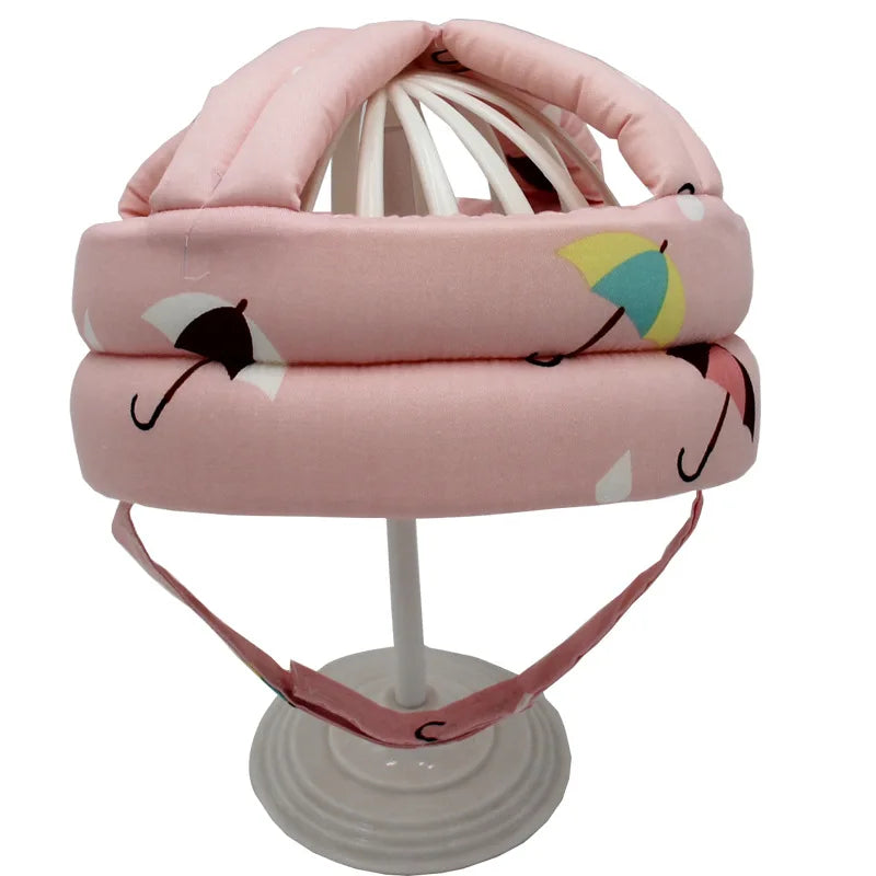 Rosa Baby-Schutzhelm mit Regenschirm-Muster, verstellbar, Sicherheitshelm für Kleinkinder.