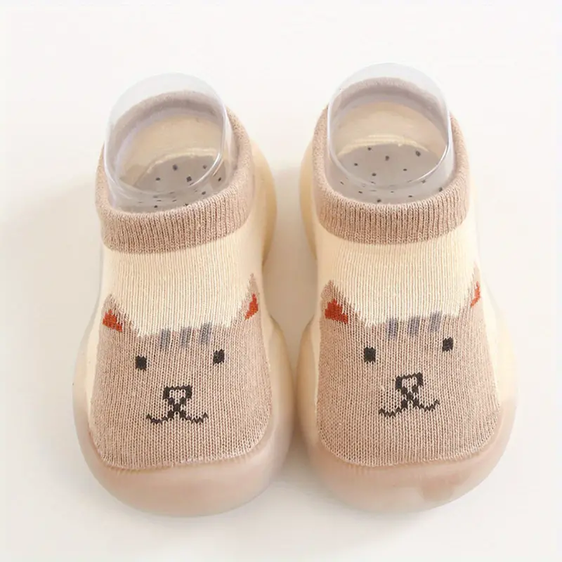 Beige Babyschuhe mit Katzenmotiv, rutschfest, weiche Sohle, für Kleinkinder, Unisex.