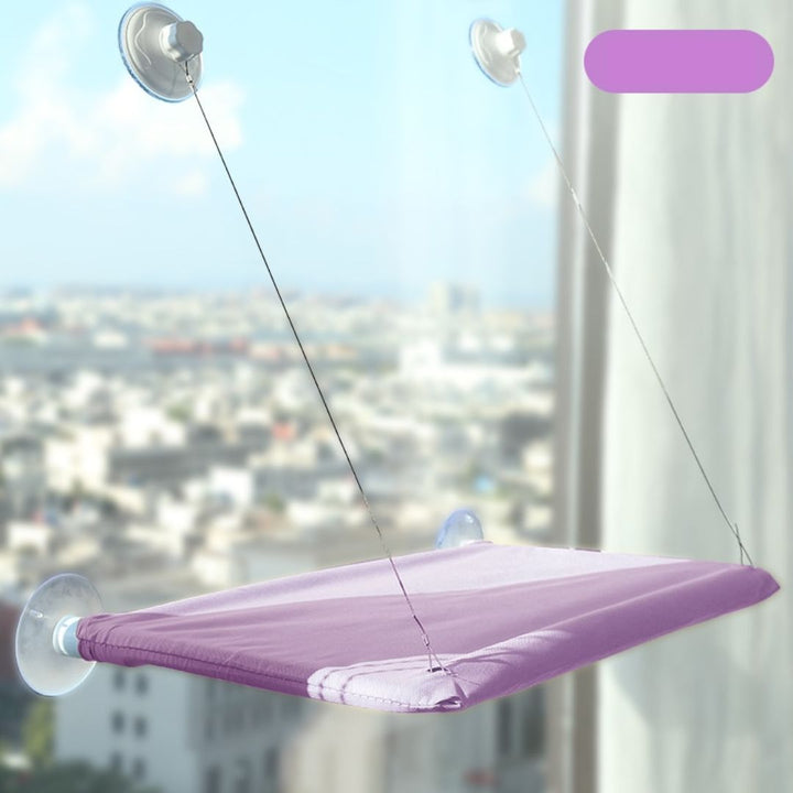 Lila Katzenfensterliege mit Saugnäpfen, stabil, bequem, Fensterbank, Katzenbett, Aussichtspunkt.