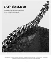 Schwarze Ledertasche mit handgewebter Kettendekoration, modisch und elegant.