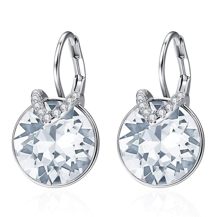 Silberne Ohrringe mit weißen Kristallen, elegantes Design, Schmuck für Damen.