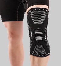 Schwarze Kniebandage aus elastischem Material für Sport und Unterstützung, unisex Design.