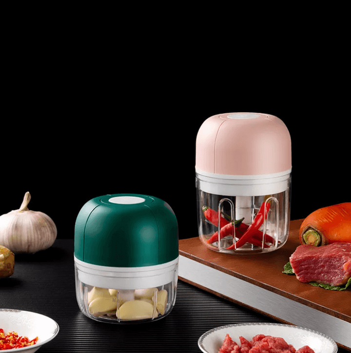 Elektrischer Knoblauchschneider, grün und rosa, mit Edelstahlklingen, Küchenzubehör.