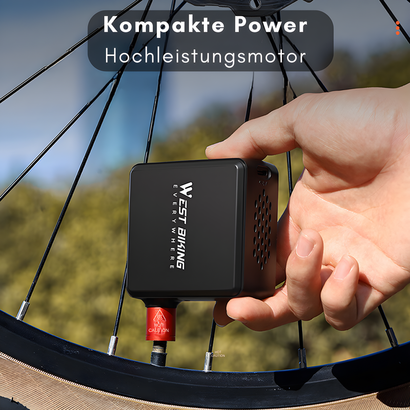 Kompakte Fahrradpumpe, schwarz, tragbar, Hochleistungsmotor, für Rennradreifen.
