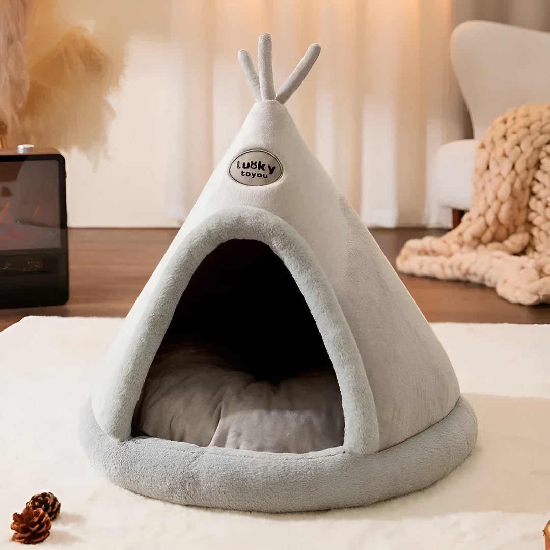 Graues, weiches Haustierbett in Tipi-Form für Hunde und Katzen, gemütlich und warm.