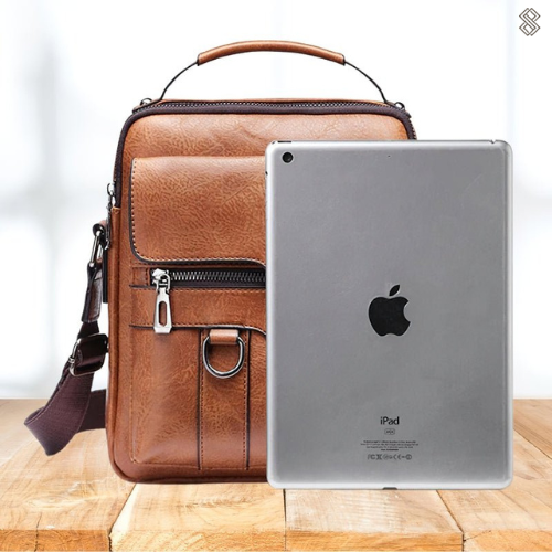 Braune Ledertasche mit Schulterriemen, ideal für Tablets, stilvolles Design, hochwertige Verarbeitung.