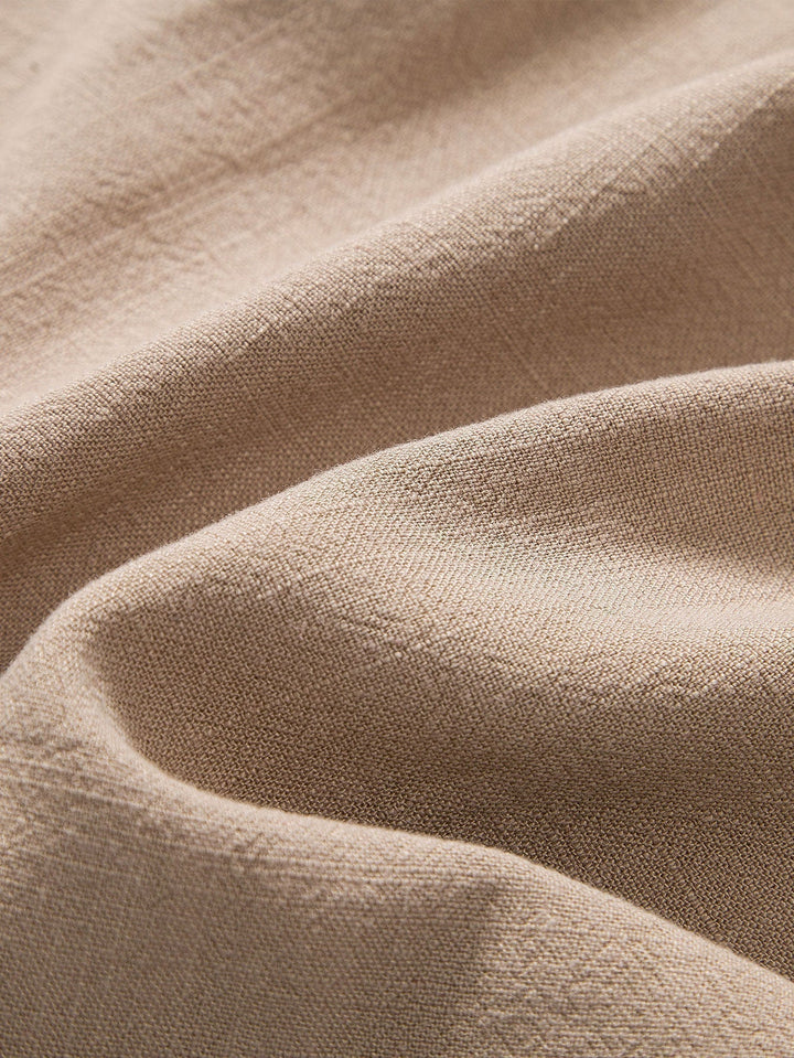 Beiger Leinenstoff, Nahaufnahme, Textur, hochwertiges Material, natürliche Faser, Stoffdesign.