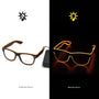 Leuchtende LED-Brille, schwarz-orange, mit Ein-/Ausschalter, modisches Accessoire.