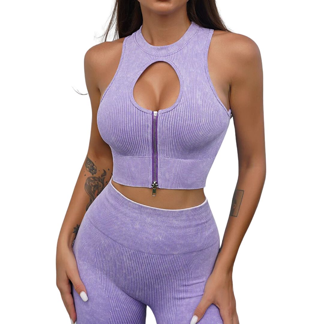 Lila Damen Sport-Set, ärmelloses Top mit Reißverschluss, nahtlose Leggings, Fitnessmode.