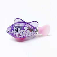 Lila batteriebetriebener Spielzeugfisch mit weißen Punkten und rosa Schwanzflosse.