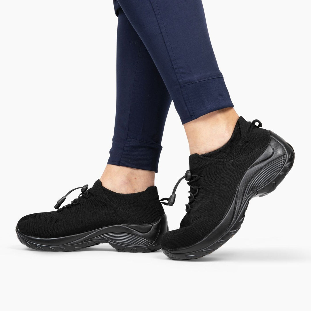 Schwarze orthopädische Stretch-Schuhe, bequem, rutschfest, ideal für Damen, Freizeitkleidung.