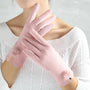 Damenhandschuhe rosa, Wildleder, mit Pompons, elegant, warm, modisch, Winteraccessoire.