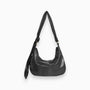 Schwarze Lederhandtasche mit Schulterriemen, modisch, elegant, Damenaccessoire.