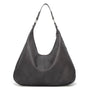Schwarze Lederhandtasche, Hobo-Stil, modisch, Damenaccessoire, elegant, vielseitig.