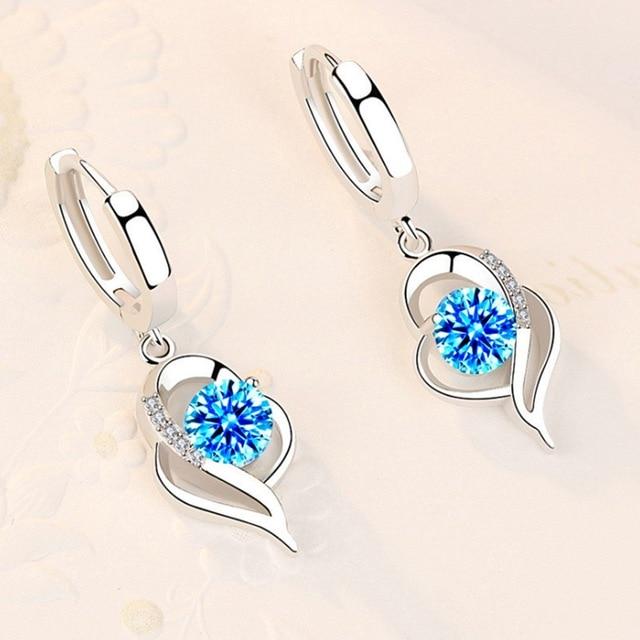 Silberne Ohrringe mit blauem Kristall, Herzdesign, Damen-Schmuck, eleganter Stil.