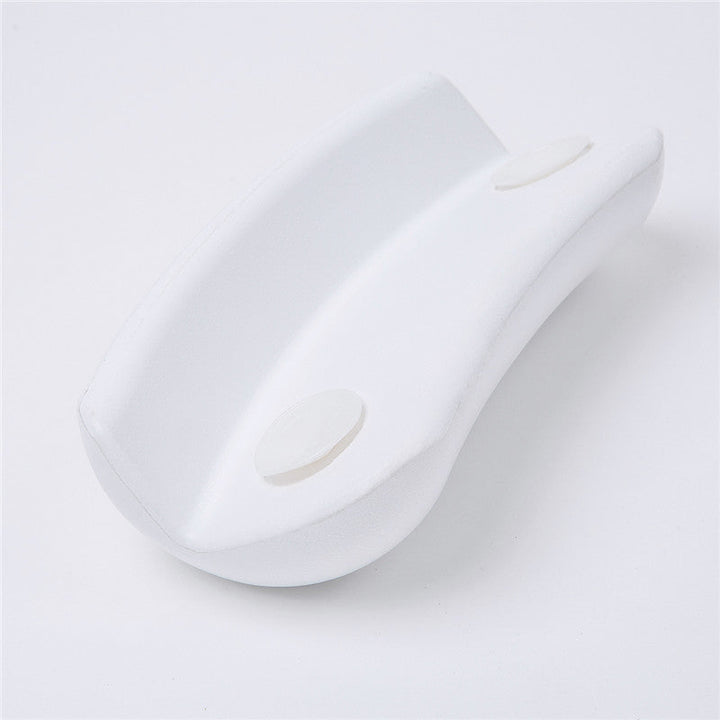 Weißer ergonomischer Türstopper aus Kunststoff für rutschfesten Halt auf glatten Böden.