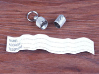 Metall-Hundemarke mit Adressetikett, silber, zylindrisch, Schlüsselanhänger, Haustierzubehör.