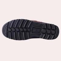 Schwarze Gummisohle mit tiefem Profil, rutschfest, langlebig, ideal für Outdoor-Schuhe.