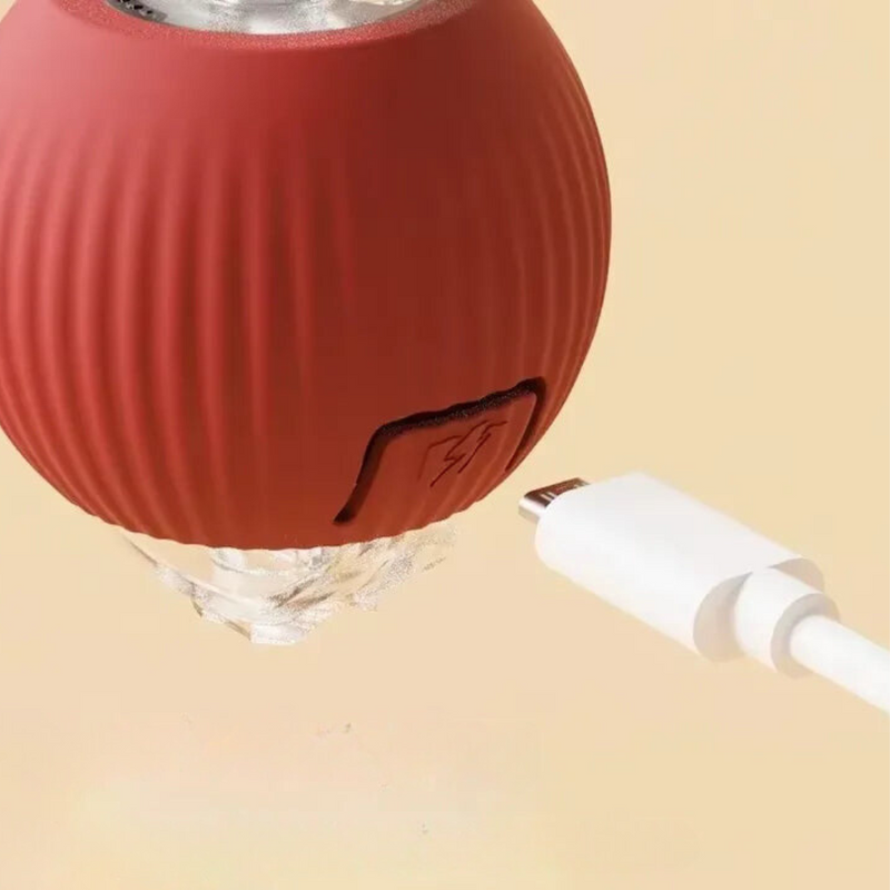 Roter Massageball mit USB-Ladekabel, elektrisch, tragbar, Muskelentspannung, Fitnessgerät.