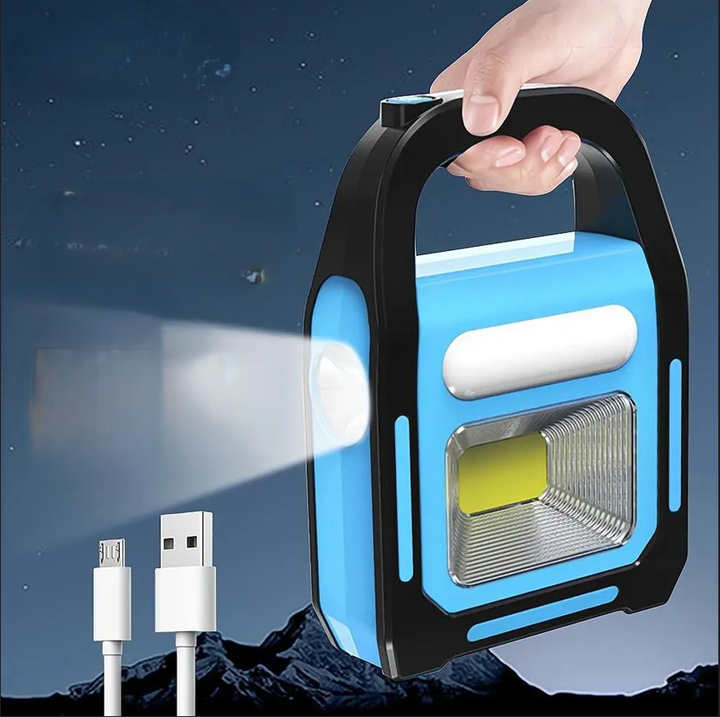 Tragbare blaue LED-Campinglampe mit USB-Ladekabel, ideal für Outdoor-Abenteuer.