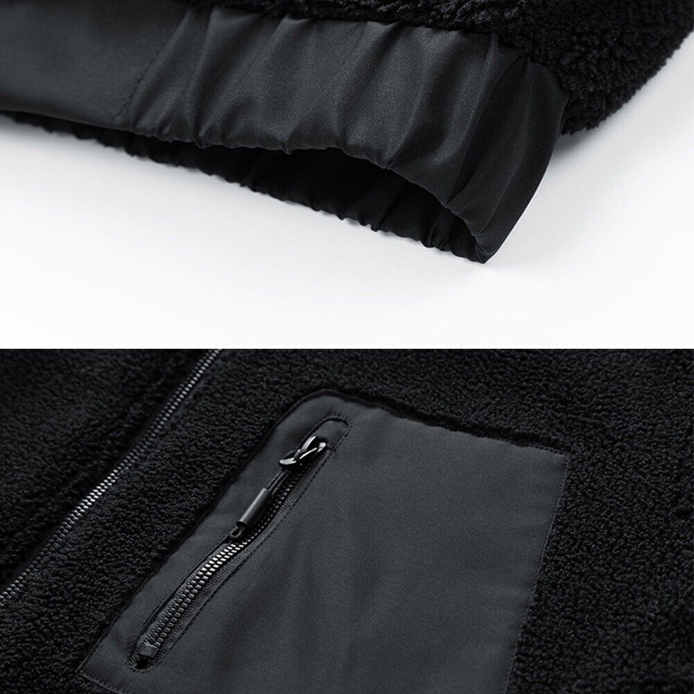 Schwarze Fleecejacke mit Reißverschlusstasche, warmes Winterkleidungsstück, Herrenmode.