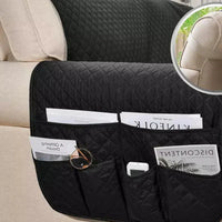 Schwarze gesteppte Sofahusse mit Taschen, universell passend, für Wohnzimmermöbel.