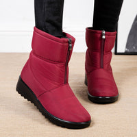 Rote Damen-Winterstiefel mit Reißverschluss, warm gefüttert, rutschfeste Sohle, modisch.