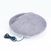 Grauer USB-Heizpantoffel, flauschig, rund, für warme Füße, ideal für kalte Wintertage.