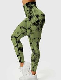 Grüne Damen-Leggings mit schwarzem Muster, hoher Taille, sportlich, bequem.