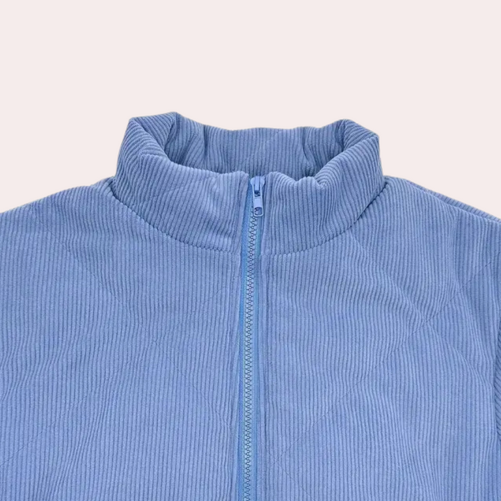 Blauer Cord-Steppjacke mit Reißverschluss, Stehkragen, modisch, warm, Damenbekleidung.