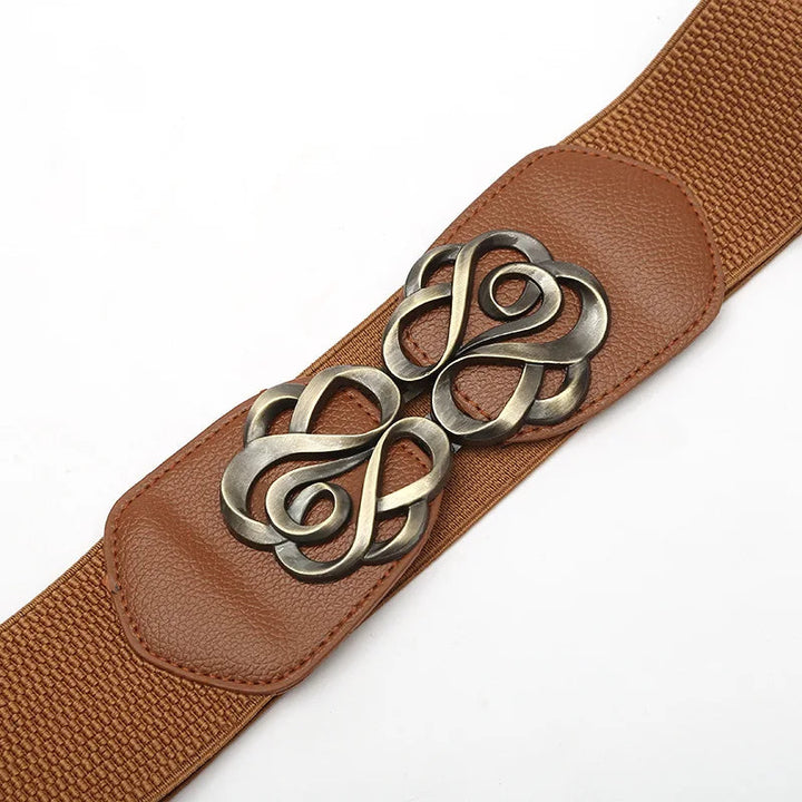 Brauner elastischer Gürtel mit dekorativer Metallschnalle, Damenmode-Accessoire.