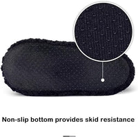 Schwarze rutschfeste Hausschuhe, weiches Material, Anti-Rutsch-Sohle, Komfort, Wärme.