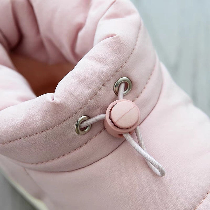 Rosa Winterstiefel mit Kordelzug, warm gefüttert, Damenmode, bequem, stilvoll.