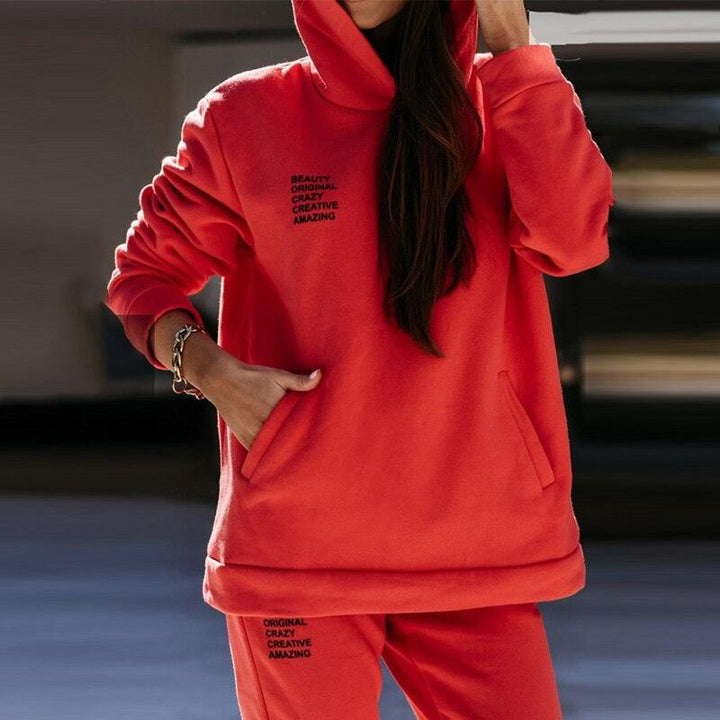 Roter Damen-Hoodie und Jogginghose Set, gemütlich, modisch, Freizeitkleidung.