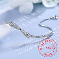 Silberarmband mit Schleife, Zirkonia, 925 Sterling Silber, Damen-Schmuck, elegant, funkelnd.