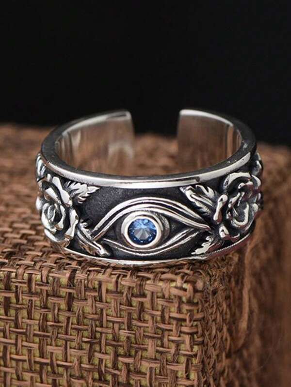 Silberring mit Auge und blauer Kristall, Rosenmuster, Herrenring, Schmuckdesign, Vintage-Stil.