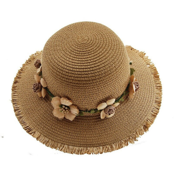 Damen Sonnenhut aus Stroh, beige, mit Blumenverzierung, ideal für Sommermode und Strand.
