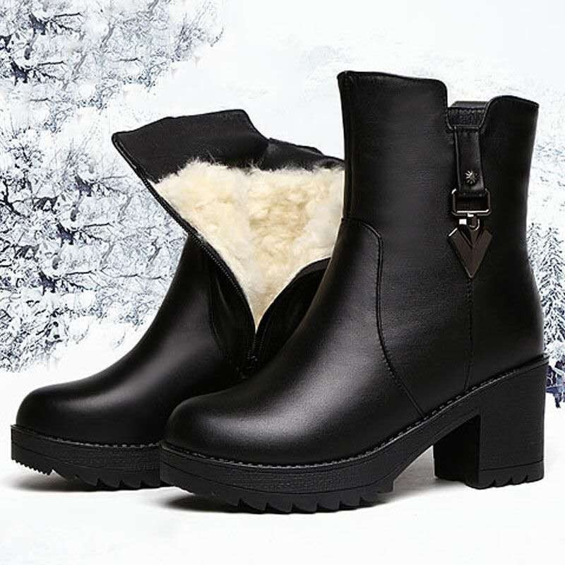 Schwarze Damenstiefel mit Absatz, gefüttert, Winterstiefel, Lederoptik, Reißverschluss.
