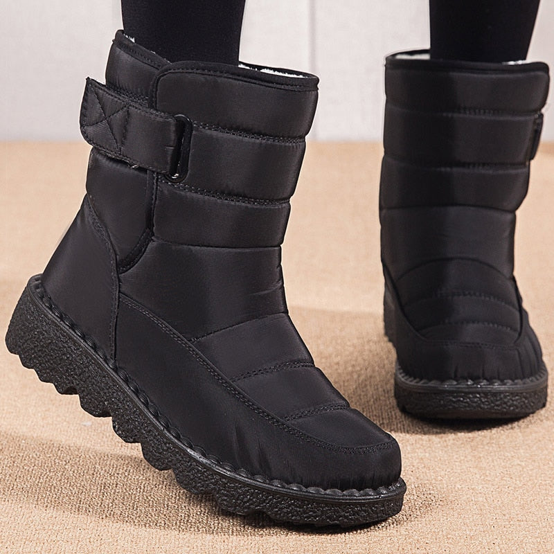 Schwarze Winterstiefel Damen, wasserdicht, gefüttert, rutschfeste Sohle, modisch, bequem.