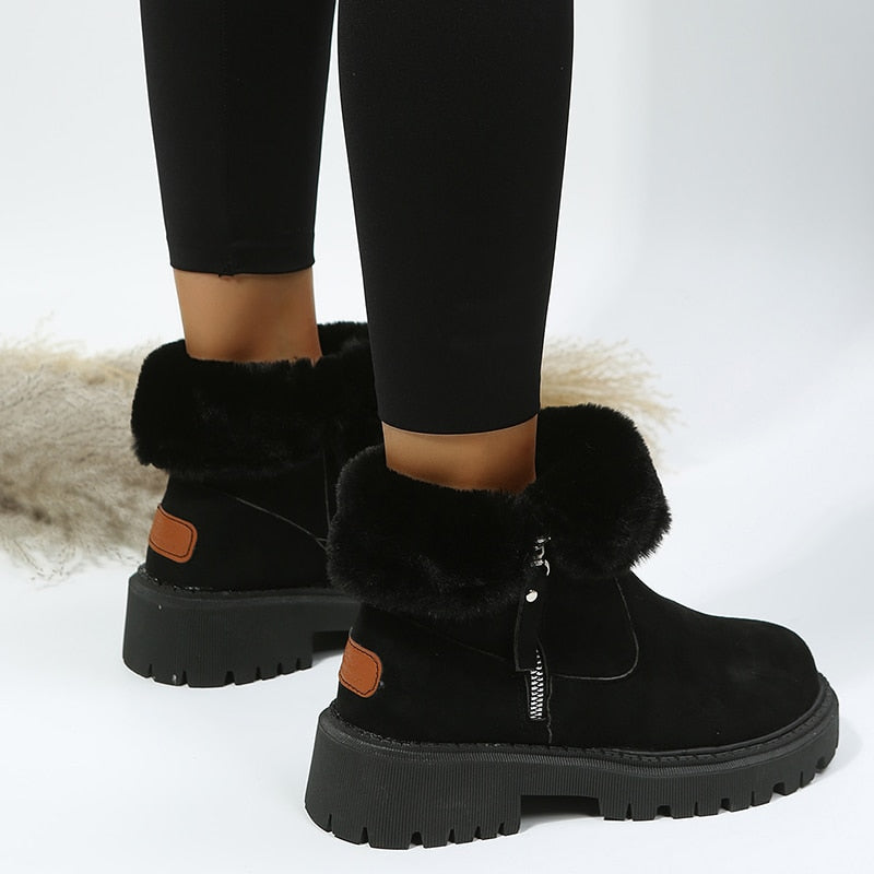 Schwarze Damen-Winterstiefel mit Fellfutter, rutschfeste Sohle, Reißverschluss, modisch.