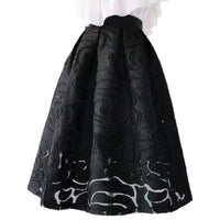 Schwarzer A-Linien-Rock mit Blumenmuster, elegant, knielang, Damenmode.