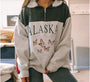 Grauer Alaska-Pullover mit Schmetterlingsmotiv, Damenmode, gemütlicher Freizeitlook.