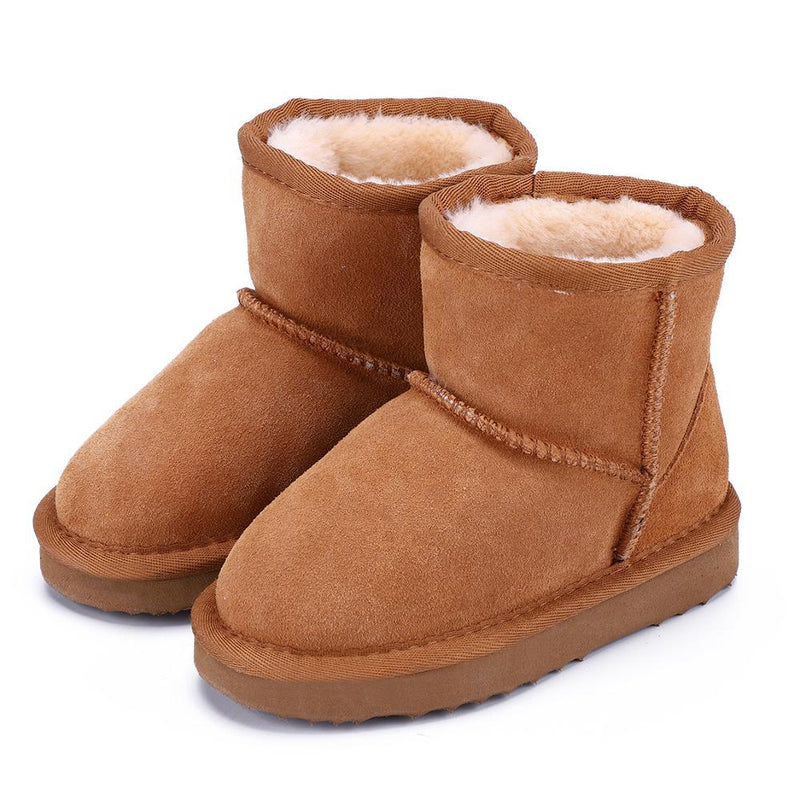 Braune Winterstiefel aus Wildleder mit Fellfutter für Damen, warm und bequem.