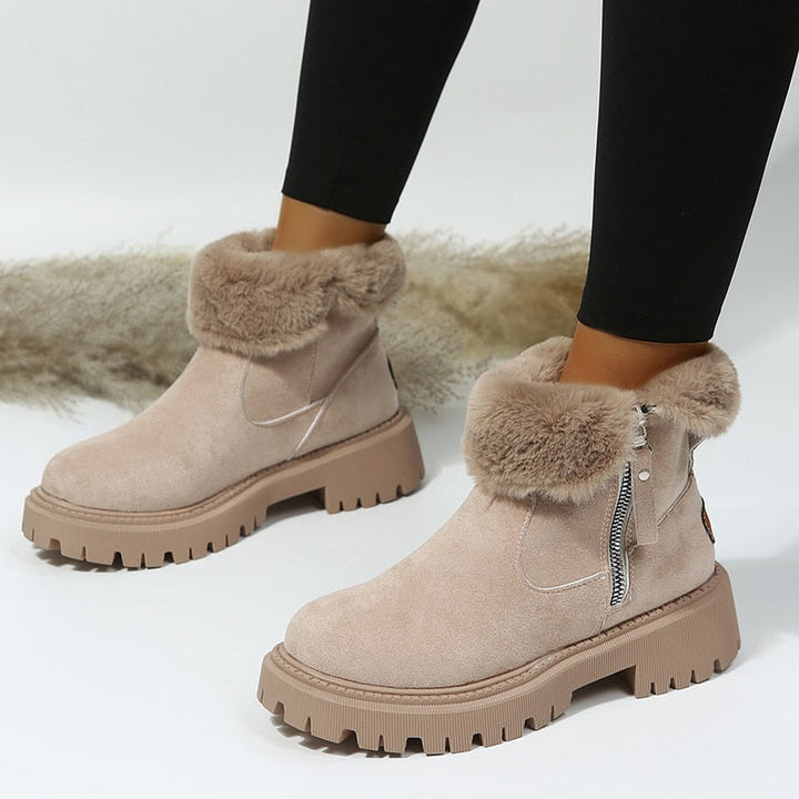 Beige Damen-Winterstiefel mit Fellfutter, Reißverschluss, rutschfeste Sohle, modisch und warm.