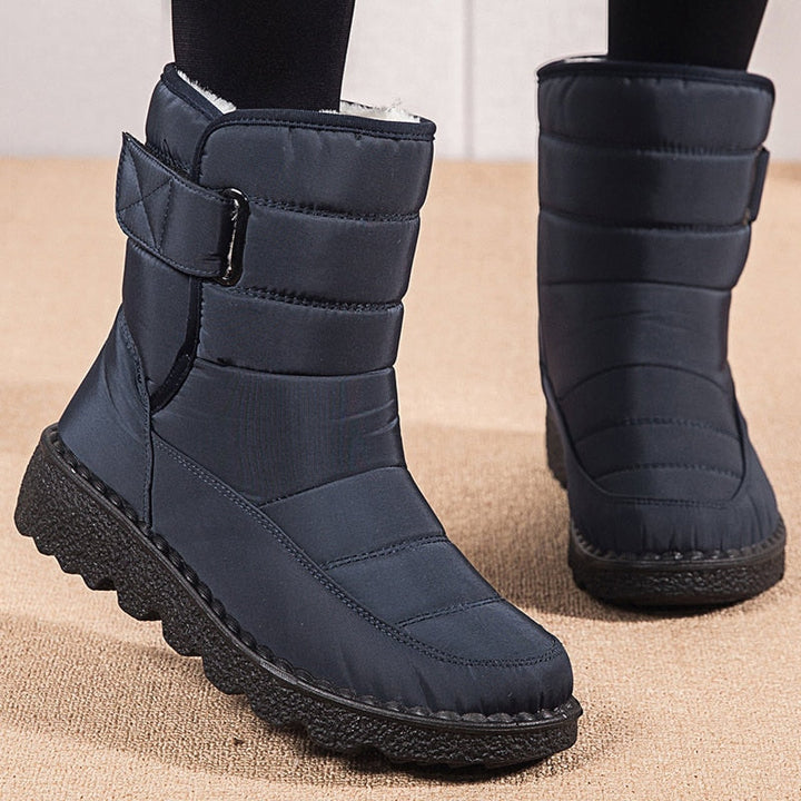 Damen Winterstiefel, schwarz, wasserdicht, gefüttert, rutschfeste Sohle, warm, bequem.