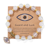 Türkisches Armband mit bösem Blick, Naturstein, Perlen, Glücksbringer, goldene Details.
