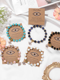 Armband mit türkischem Auge, Natursteinperlen, Glücksbringer, verschiedene Farben, Geschenkidee.