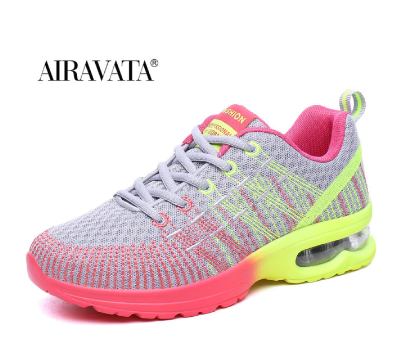 Grauer Sportschuh mit pinken und gelben Akzenten, Air-Sohle, Damen Sneaker, atmungsaktiv.